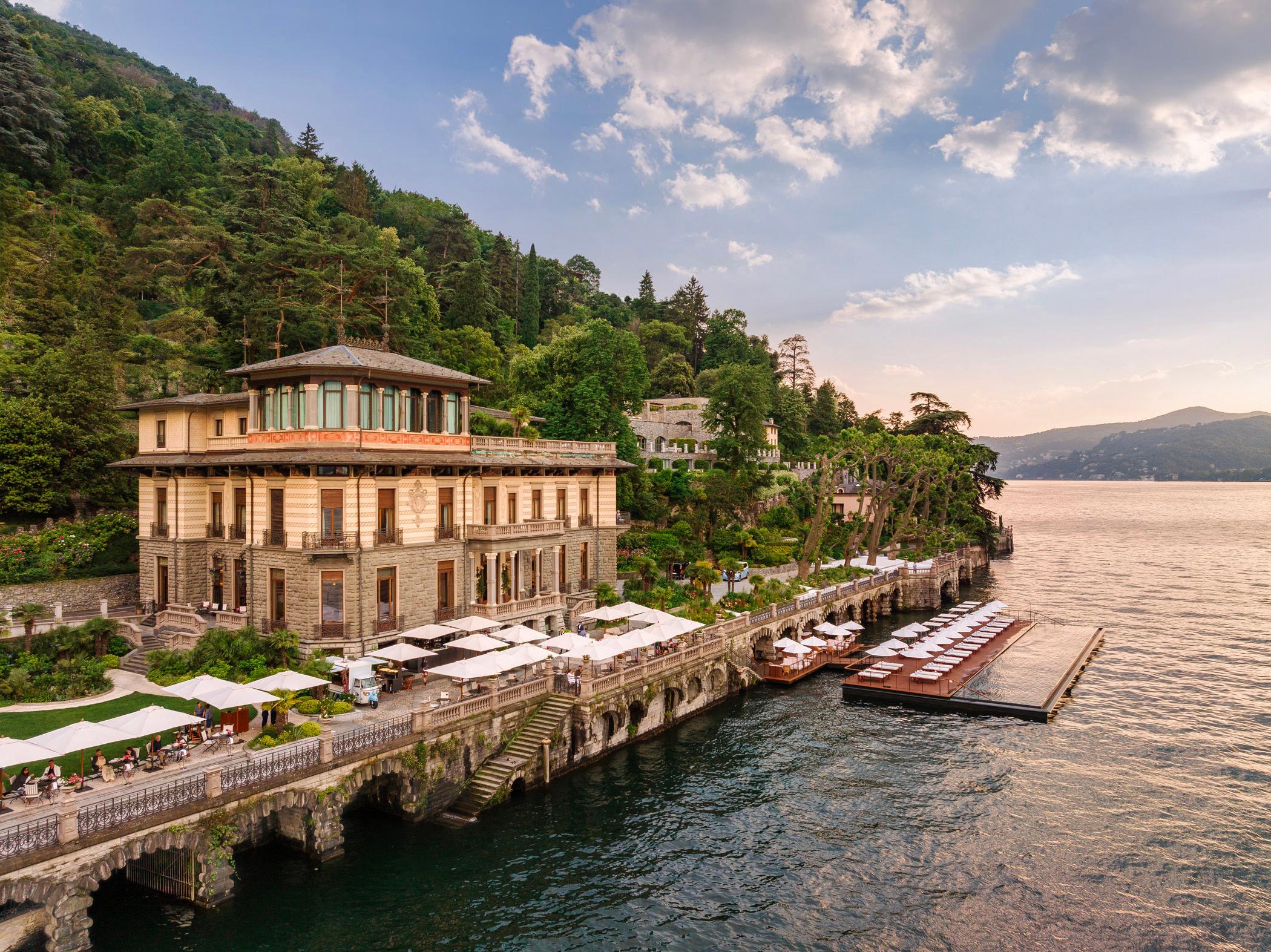 Mandarin Oriental, Lake Como: neoclassical waterfront building with private dock and wooden boats moored in clear water
