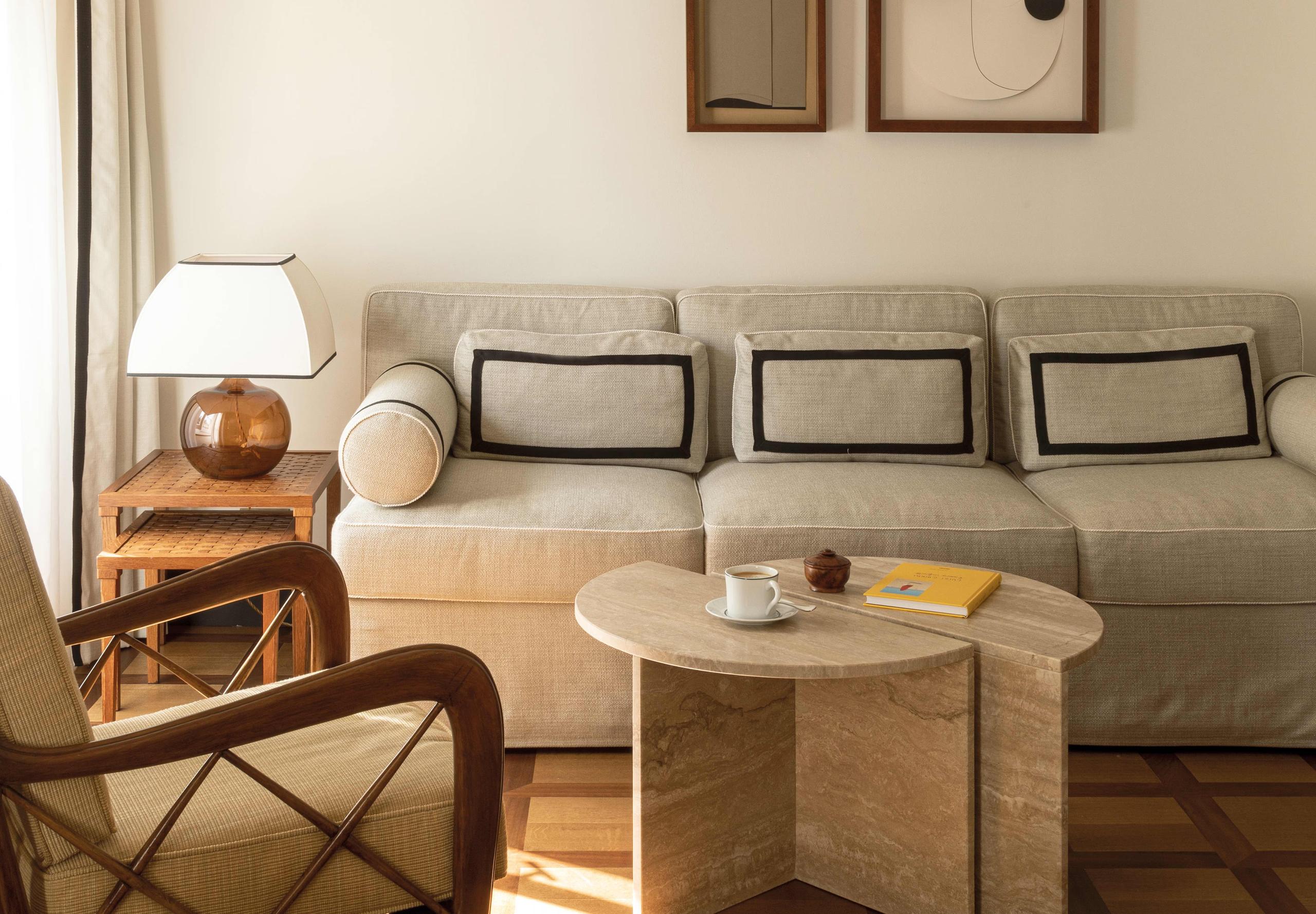 Sitting area with upholstered sofa and coffee table