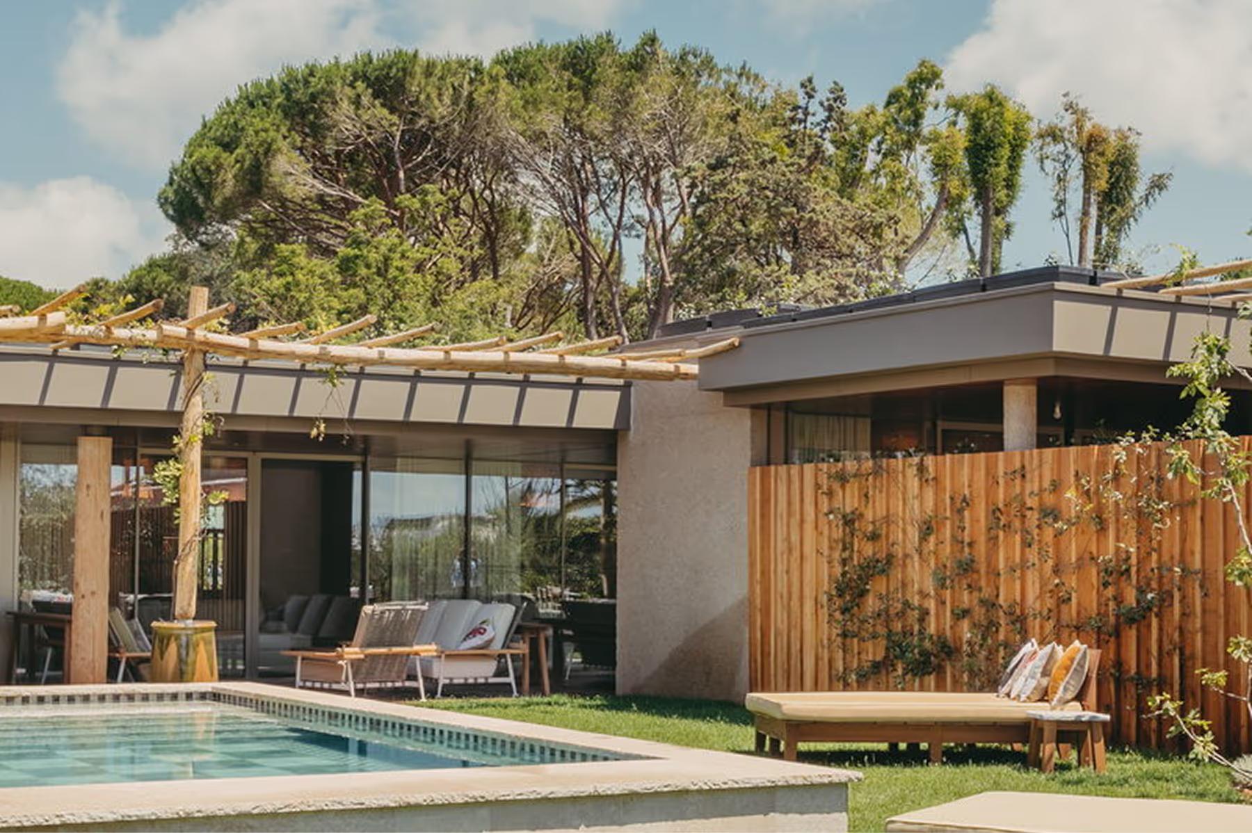 Lily of the Valley: modern villa with wood siding and private pool among mature landscape