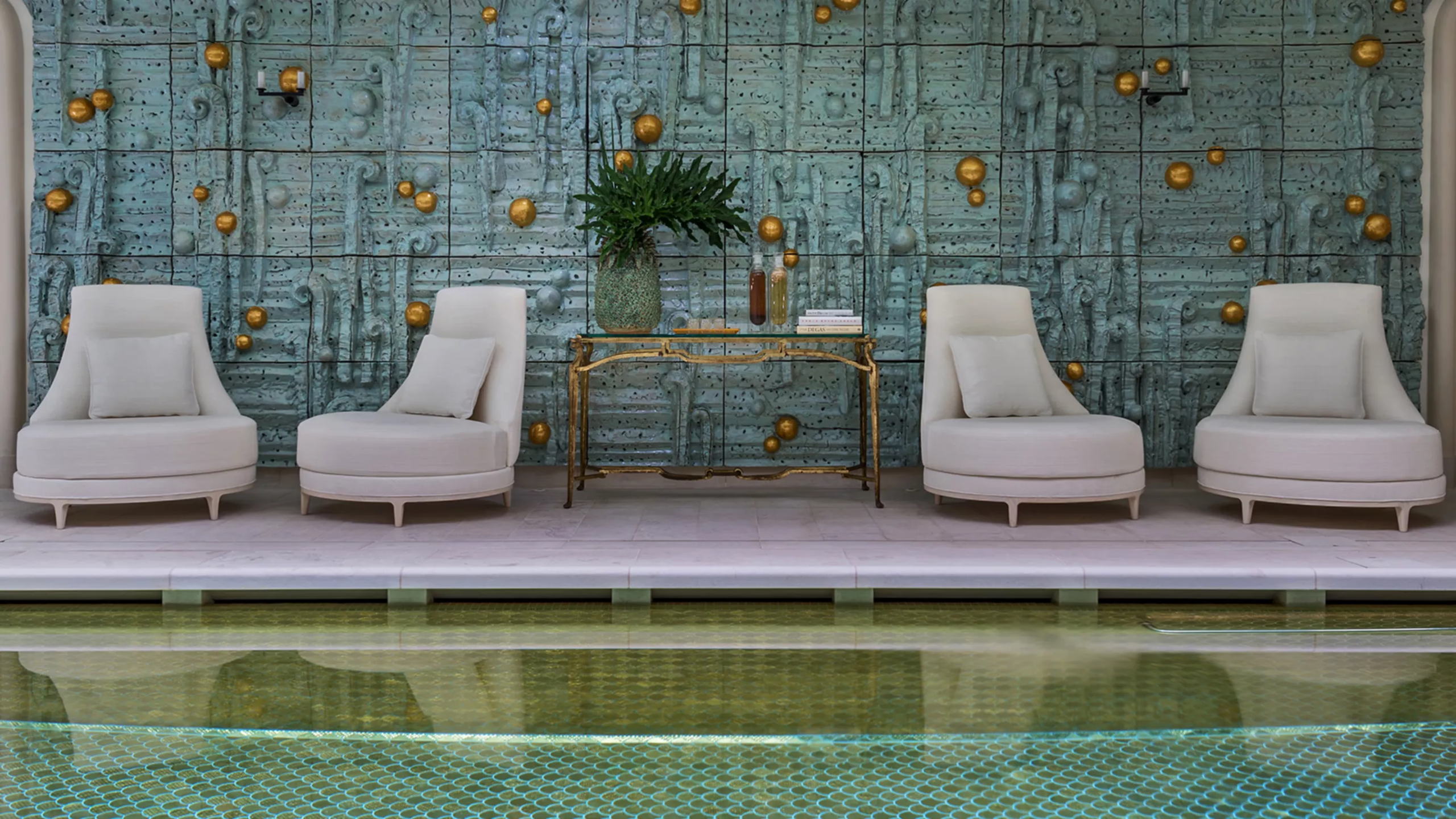 Hôtel de Crillon: spa treatment room with dark wood cabinetry and minimalist design