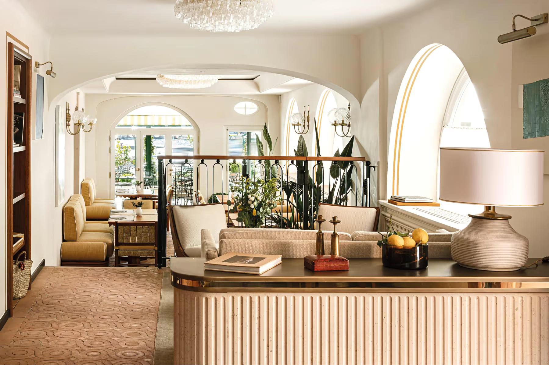 Hotel lobby interior with arched entry and seating