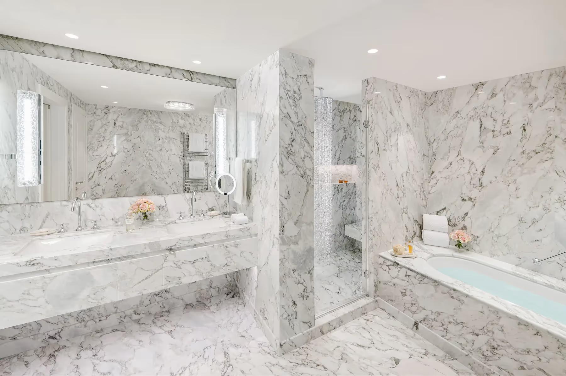 Mandarin Oriental, Lake Como: modern bathroom with marble cladding, walk-in shower, and double vanity