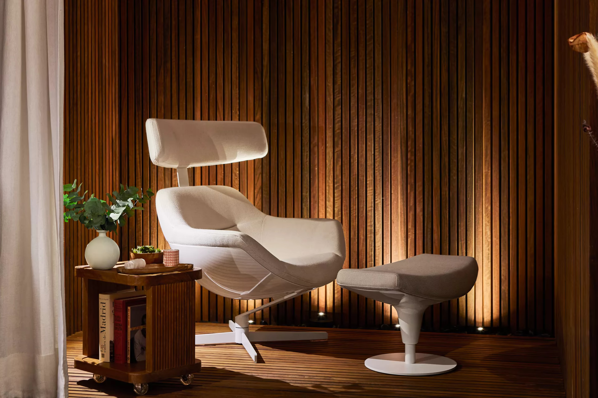 Rosewood Villa Magna: a spa relaxation area with cream-colored lounge chairs and warm wood accents