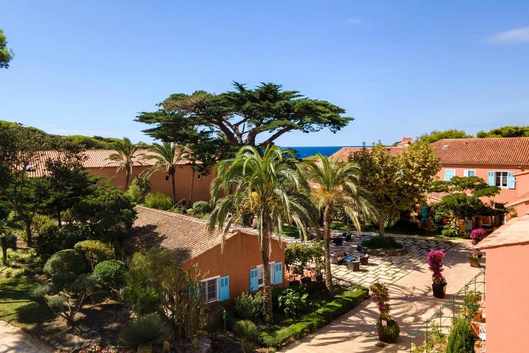The Provençal hamlet of Le Mas du Langoustier, home to the restaurant La Pinède, on the western tip of Porquerolles