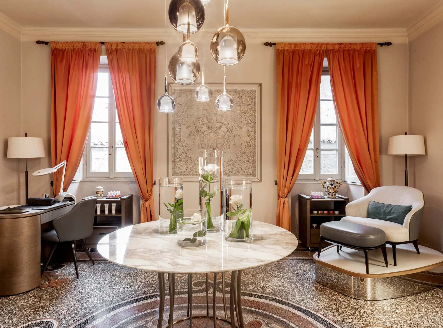 Grand Hotel Tremezzo: elegant sitting room with round table, pendant lights, and red curtains