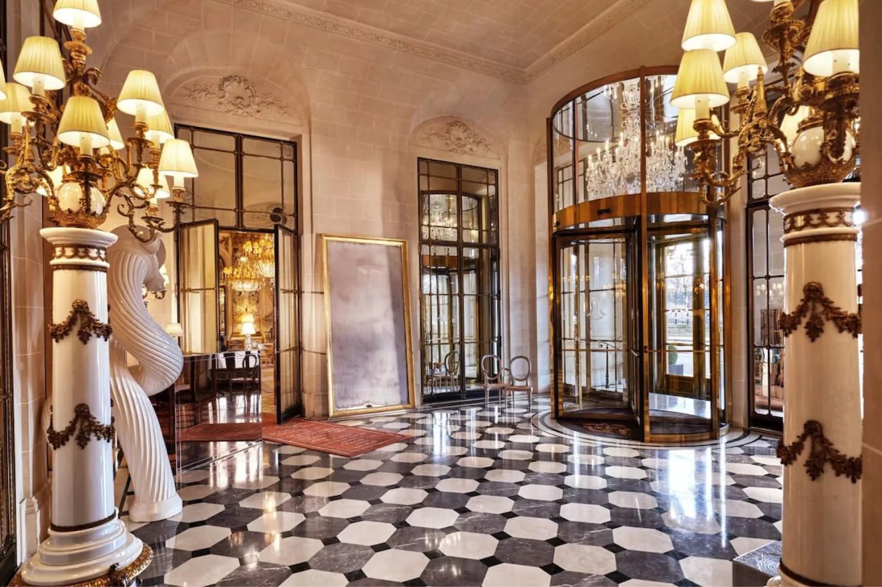 Le Meurice: the hotel’s ornate entrance hall with gilt architectural details and classical marble flooring