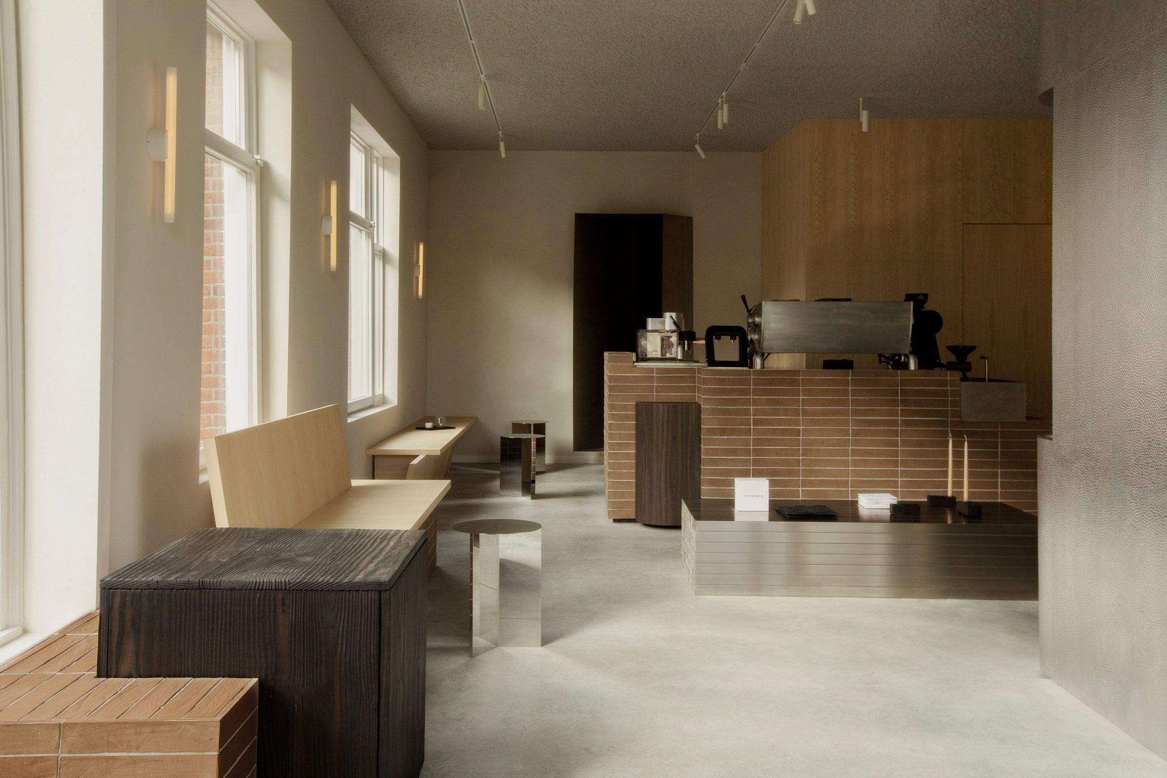 The tiled counter and oak wall inside Dak’s showroom
