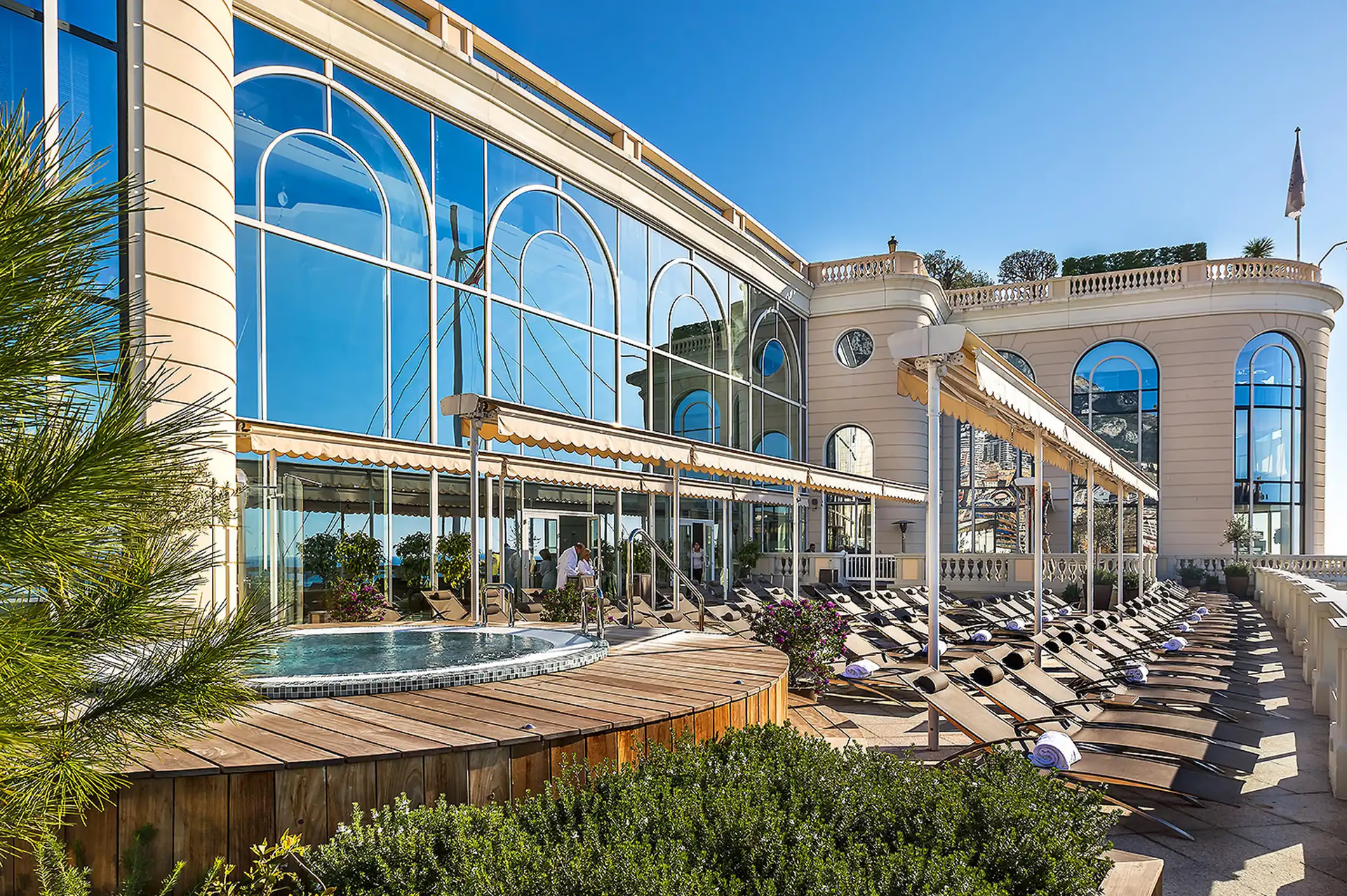 Hôtel Hermitage Monte-Carlo: modern spa facility with stone exterior and geometric architectural design