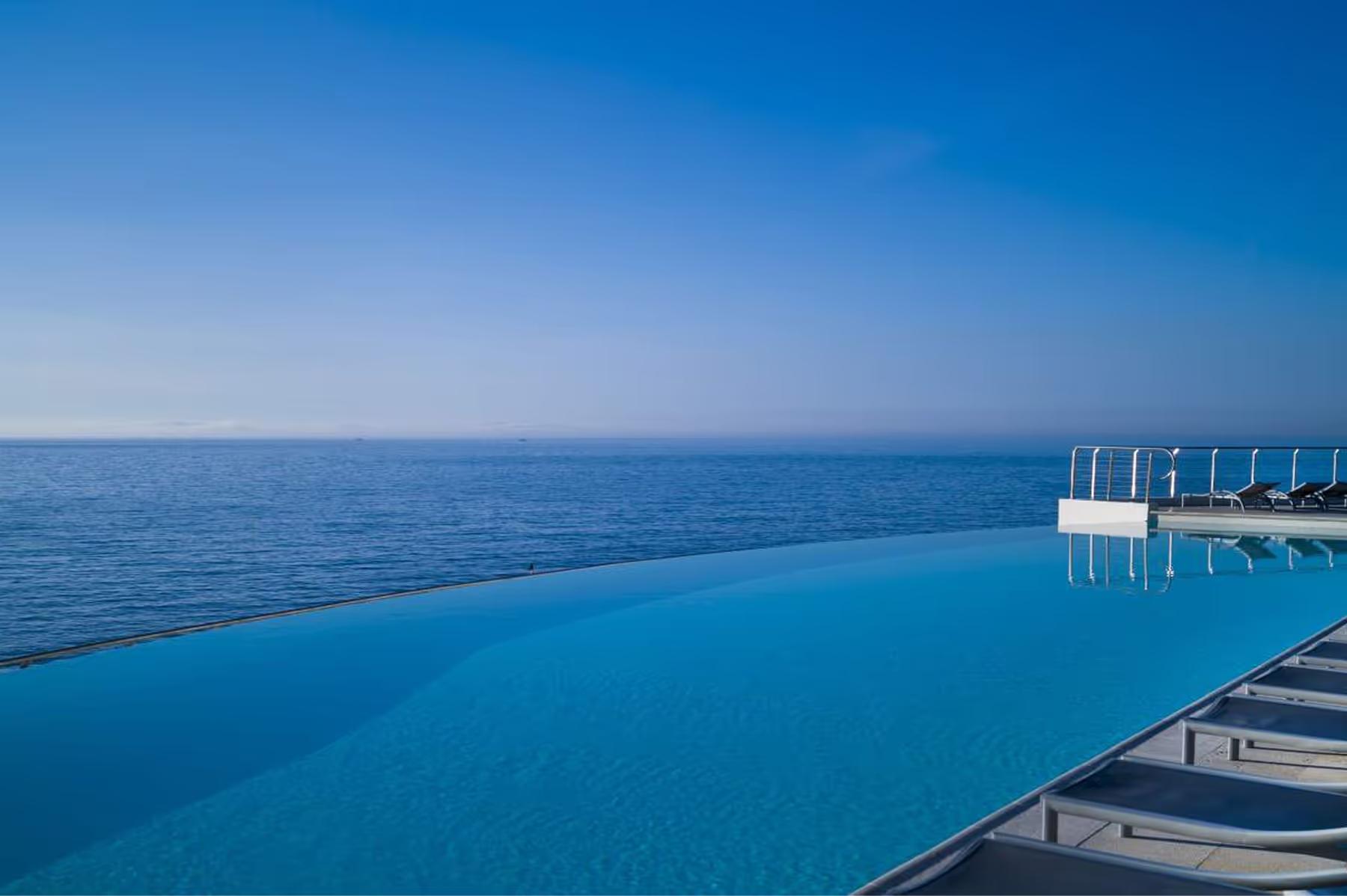 Hotel Cap-Estel: an infinity pool edges seamlessly into the sparkling Mediterranean Sea