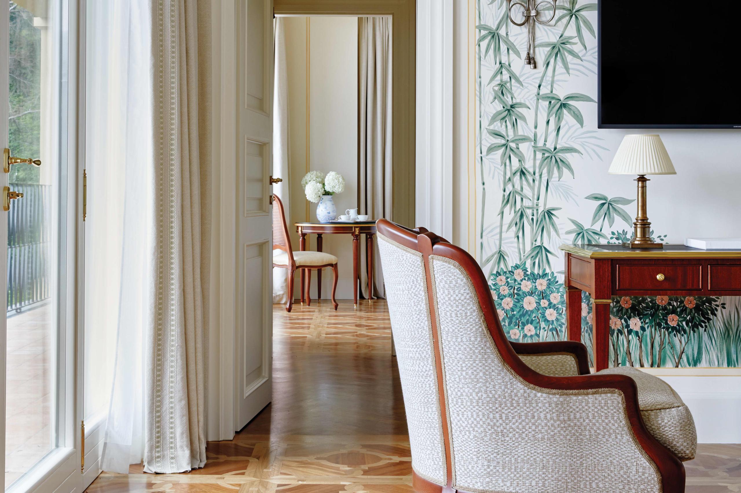 Splendido: an interior hallway with ornate doors and transitions between living spaces