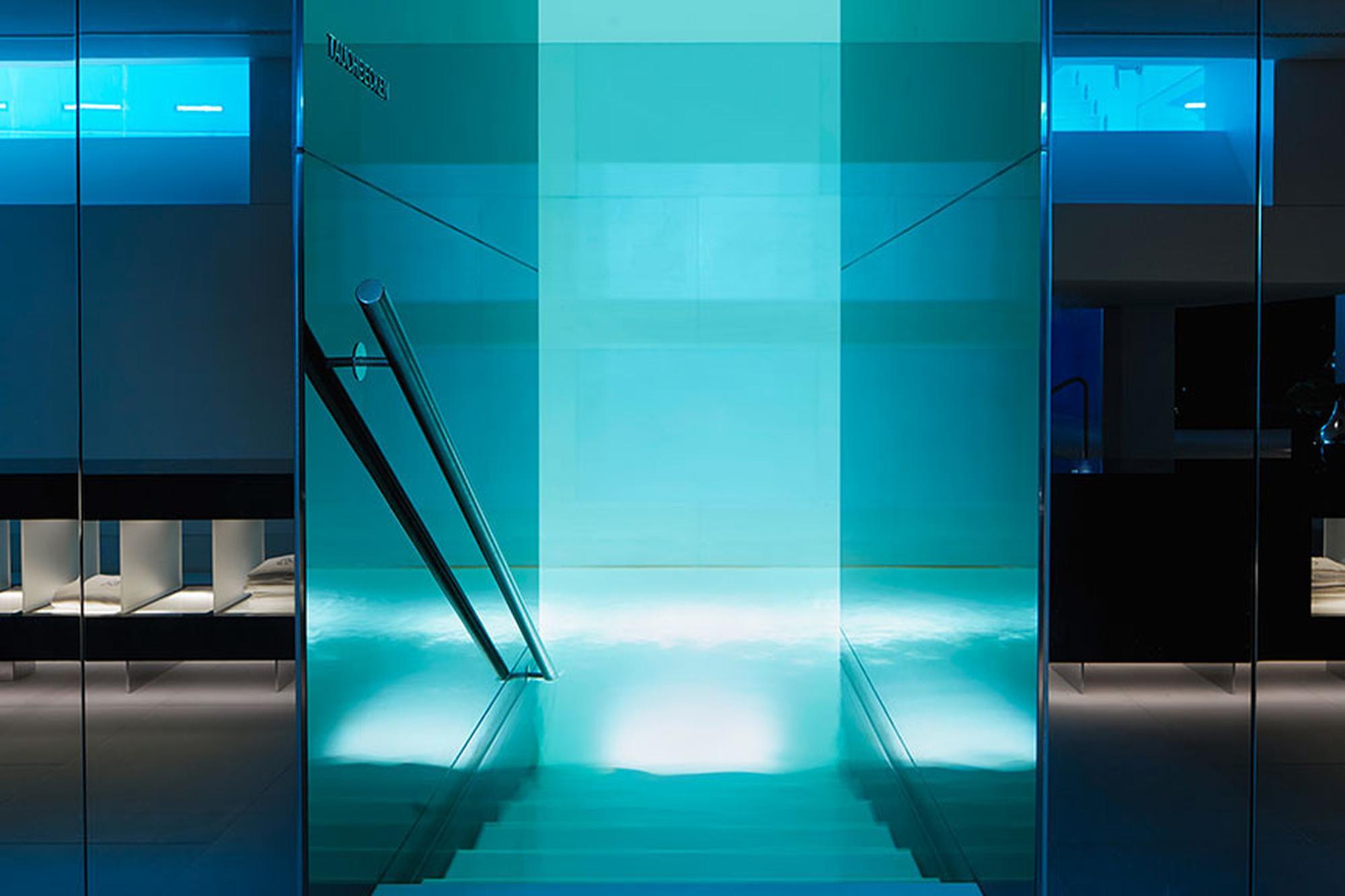 Park Hotel Vitznau: spa relaxation pool with tranquil turquoise water and glass architecture