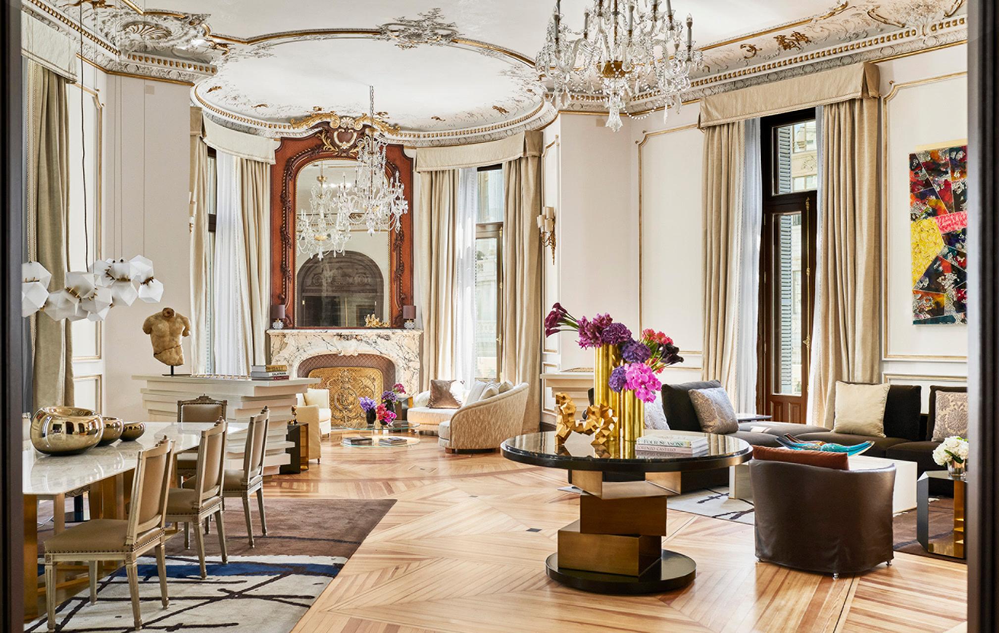 Four Seasons Hotel Madrid: penthouse suite with crystal chandeliers, frescoed ceiling, gilt mirrors, and gold-toned marble