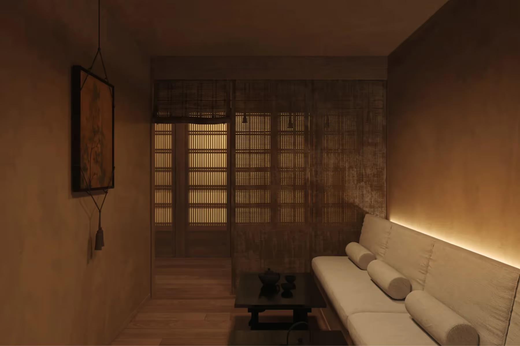 Hôtel Balzac: a spa treatment area with a sofa and modern fixtures in wood and cream tones