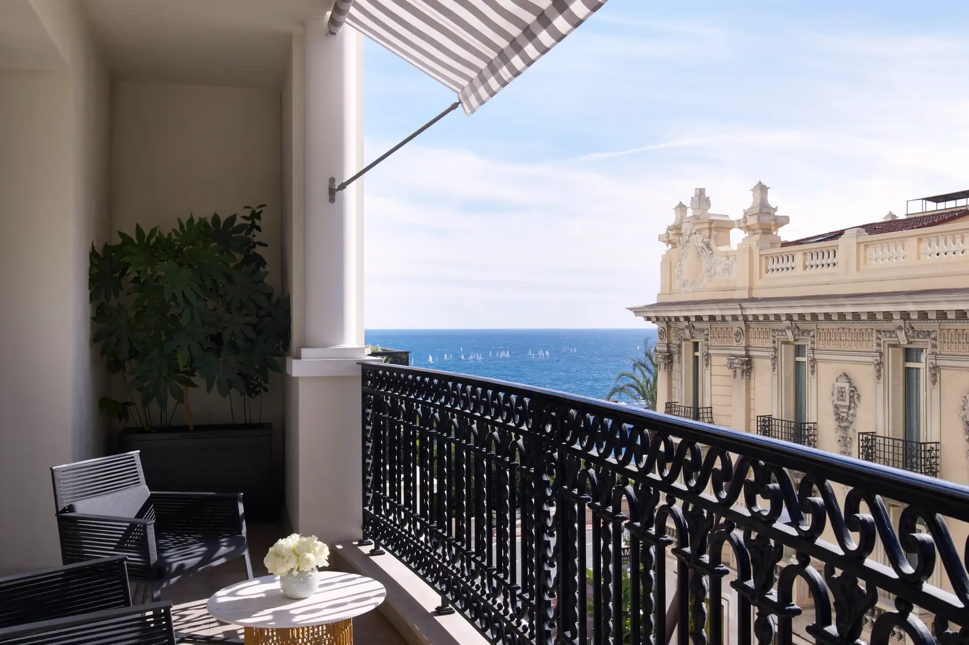 Hôtel de Paris Monte-Carlo: private balcony with lounge chair overlooking palazzo and Mediterranean