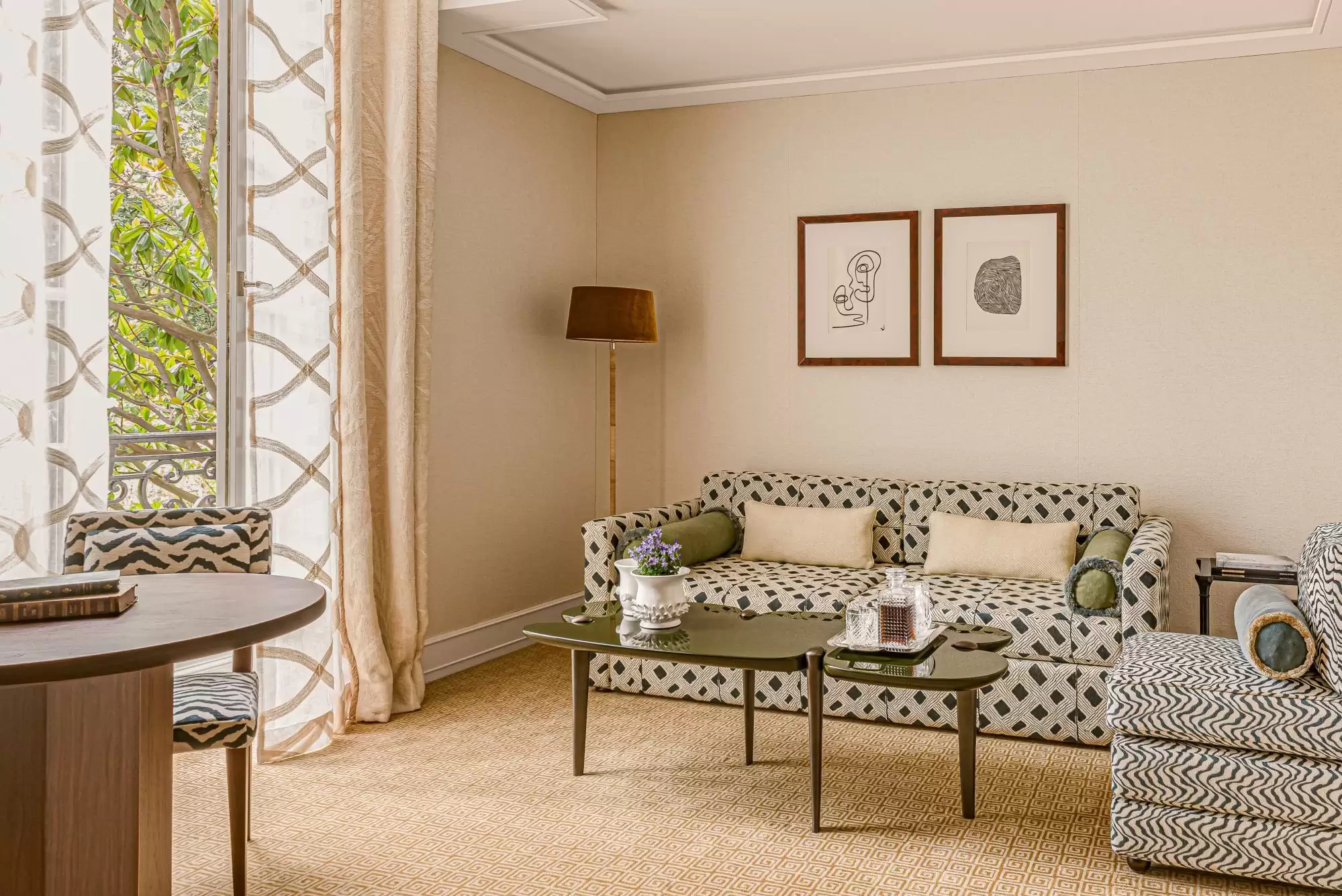 Saint James: double bedroom with metal frame bed, marble accents, and artwork above headboard