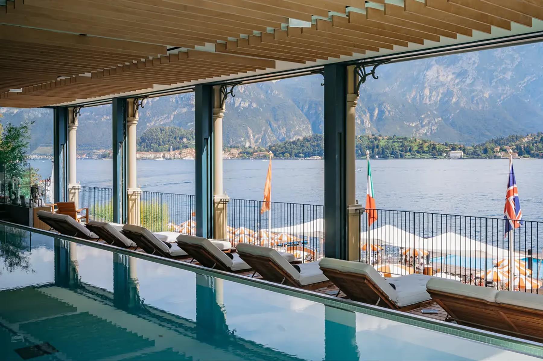 Grand Hotel Tremezzo: indoor pool area with large windows framing lake and mountain views