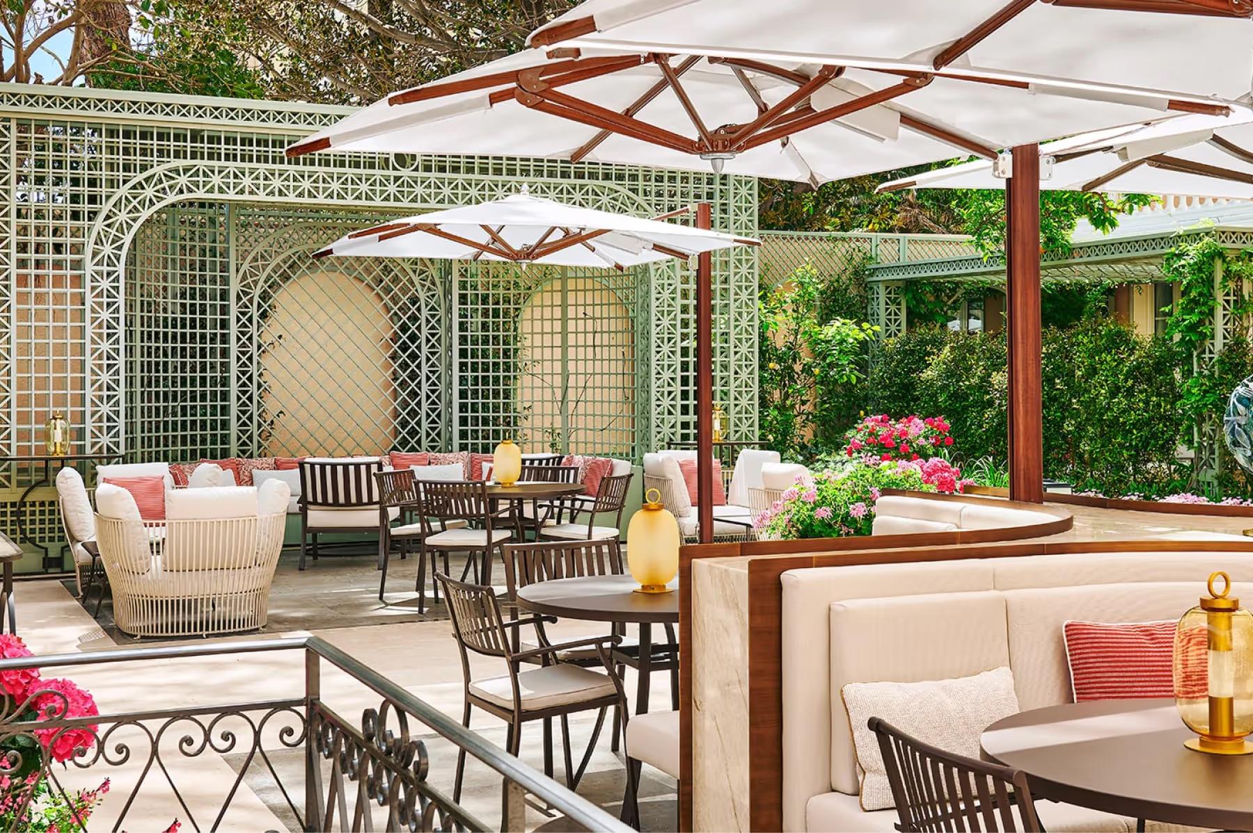 Outdoor garden terrace with seating and flowering plants