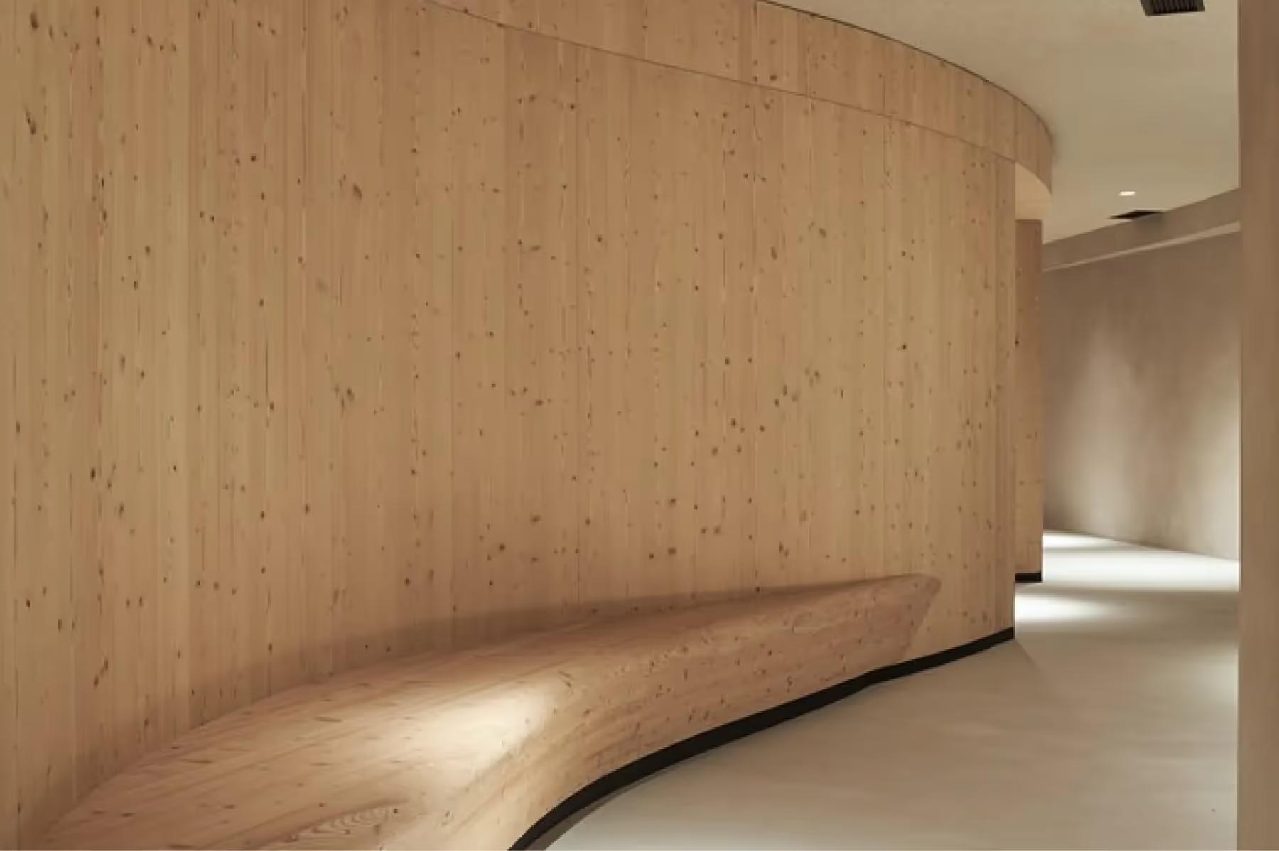Forestis: a spa preparation area with light wood and concrete, a functional sink counter, and neutral tones