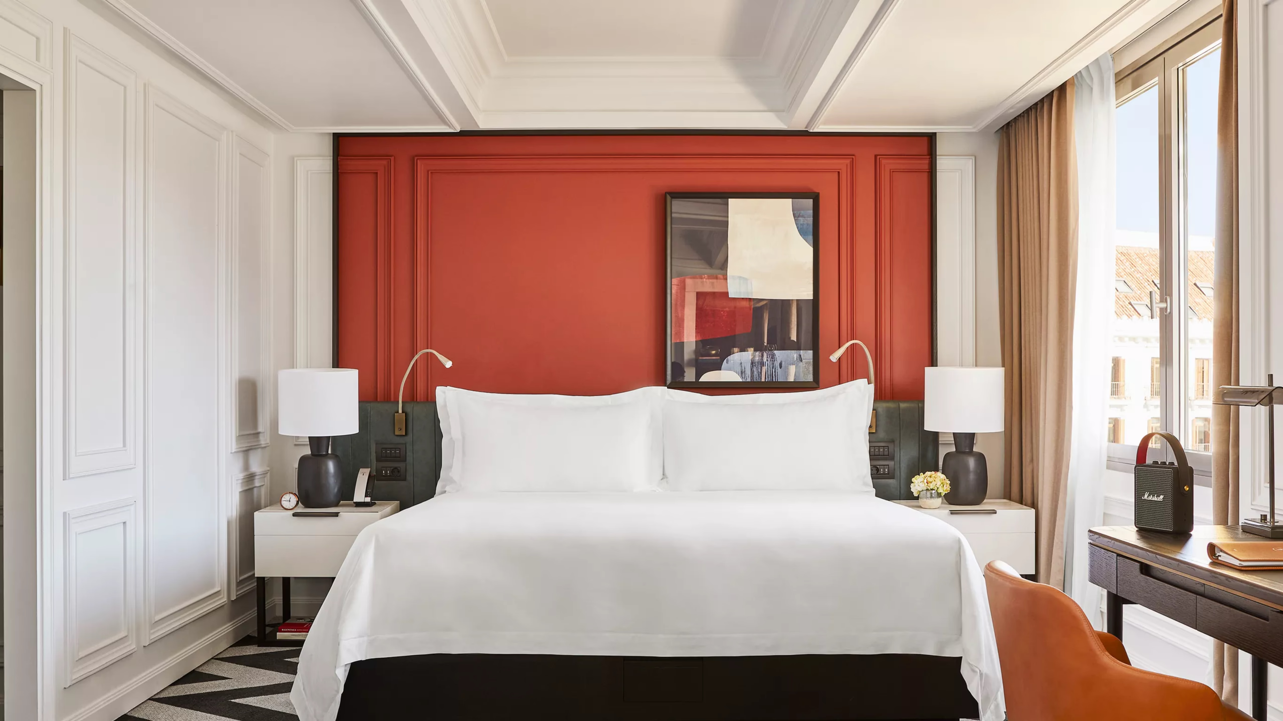 Rosewood Villa Magna: a bedroom with a red upholstered headboard, white bedding, and mirrored walls