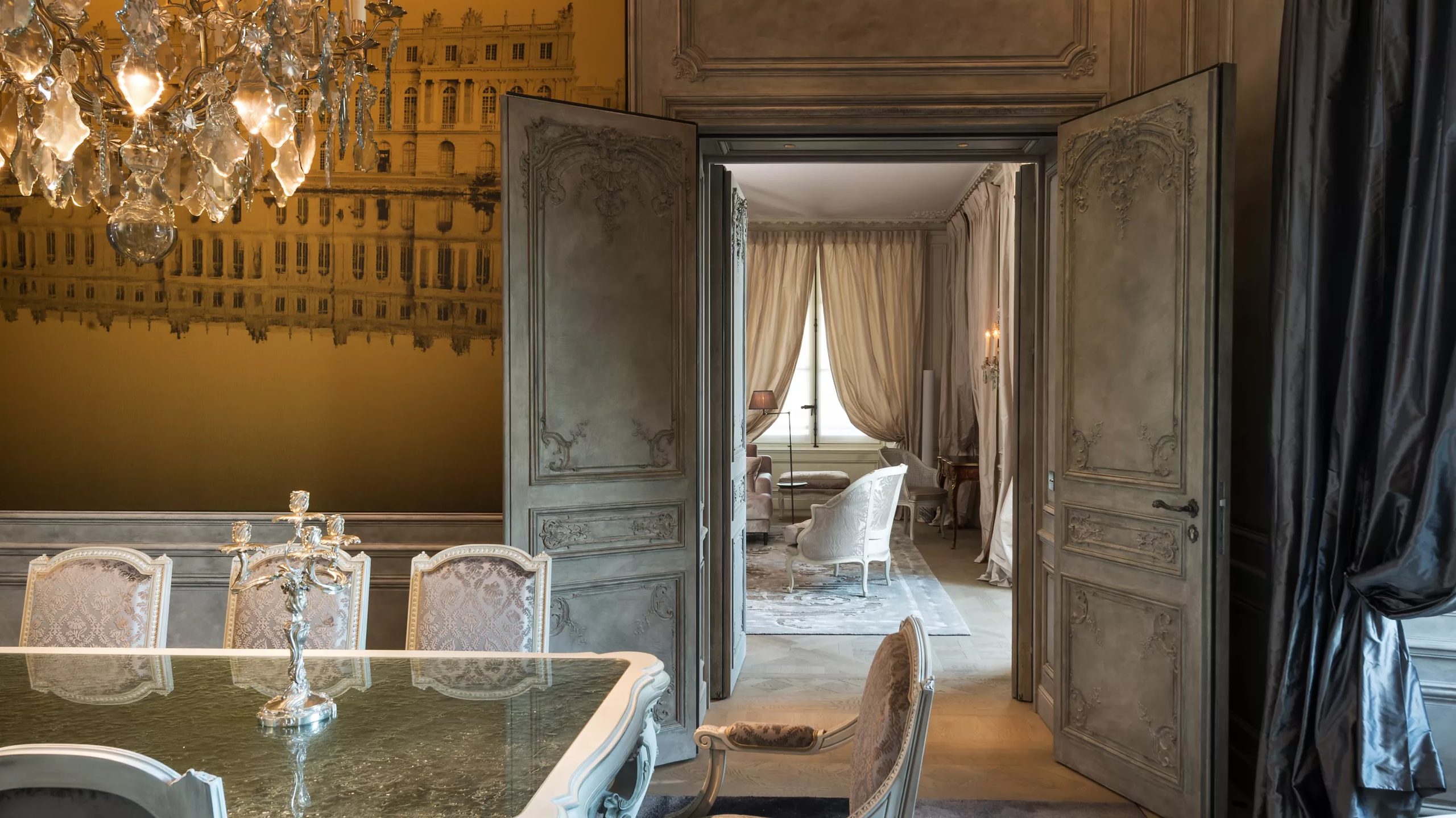 Hôtel de Crillon: contemporary spa corridor with dark accents and modern lighting in cream tones
