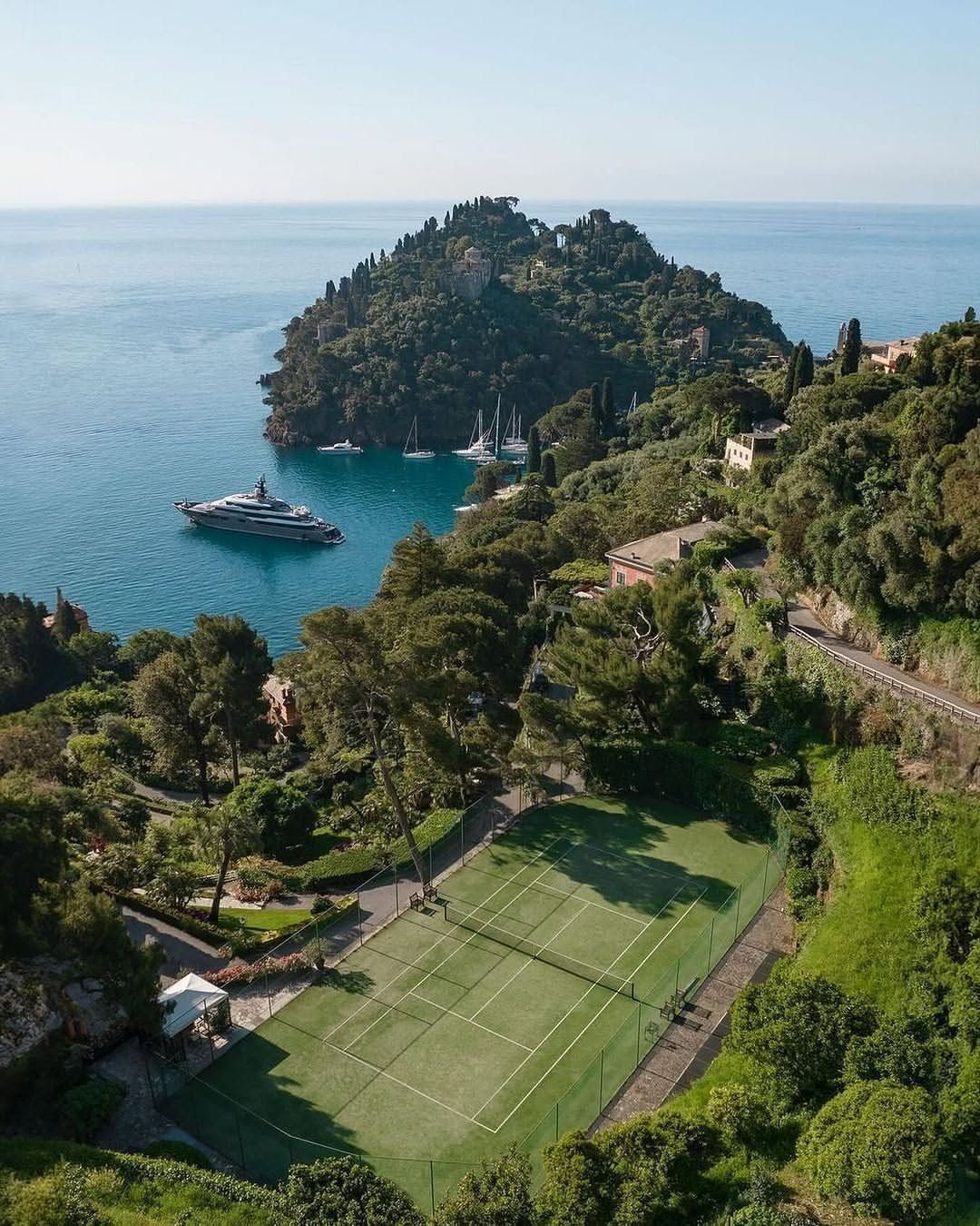 The tennis court on the hillside above Portofino harbour at Splendido
