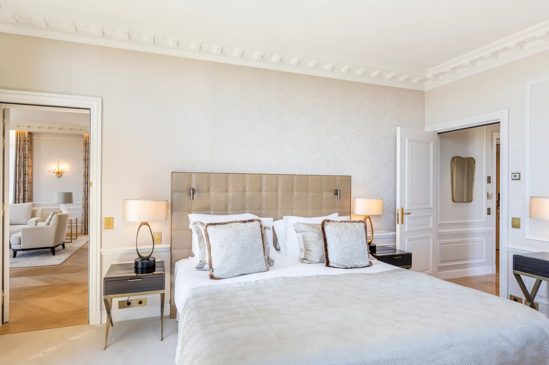 Hôtel Hermitage Monte-Carlo: neutral tone bedroom with beige headboard, paired lamps and sitting area with sea views