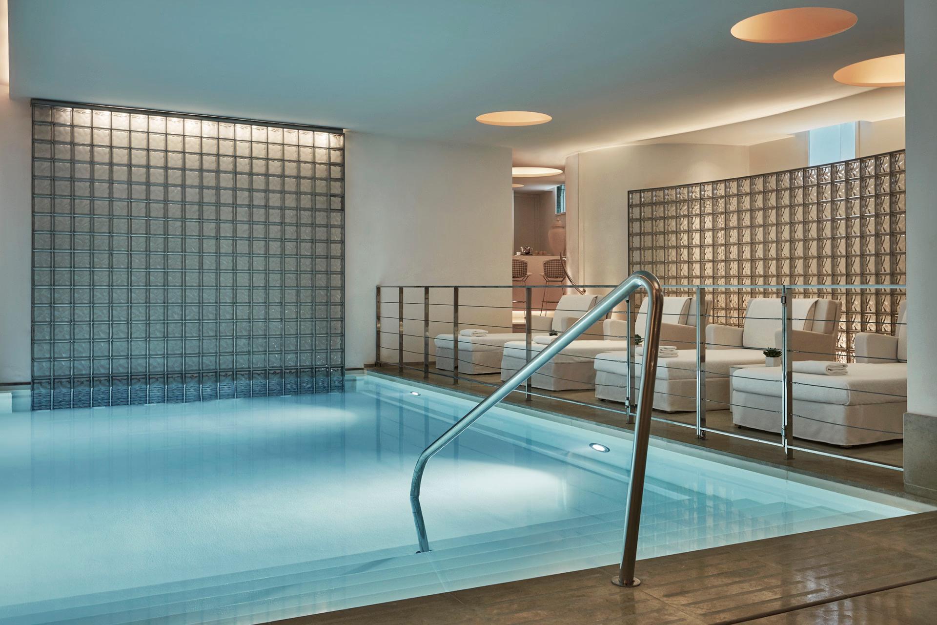 Grand-Hôtel du Cap-Ferrat: indoor pool with blue tile and tall glass windows