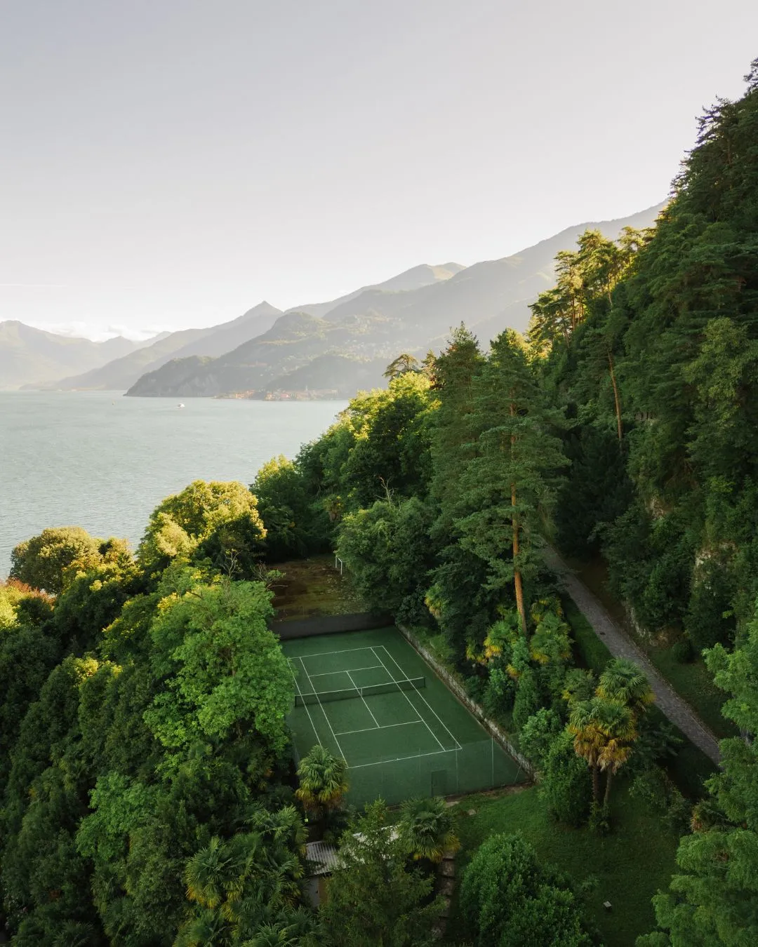 A tennis court in the wooded gardens above Bellagio at Grand Hotel Villa Serbelloni