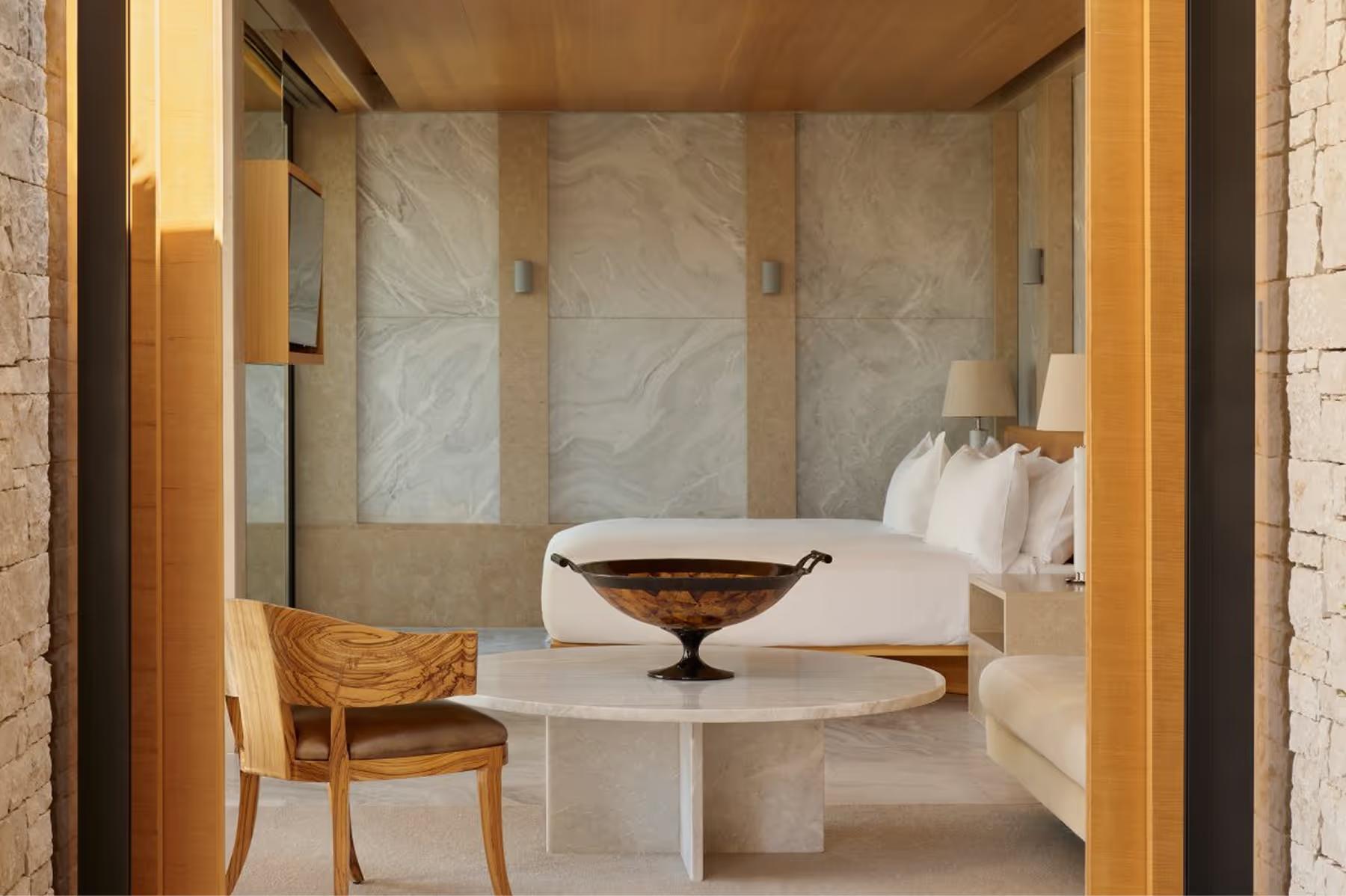 Sunlit interior space with golden wood accents and stone walls