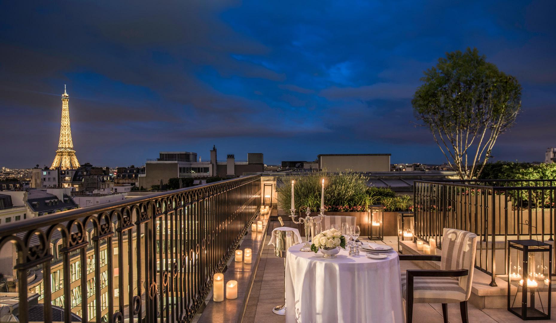 The Peninsula: indoor rooftop dining with floor-to-ceiling windows, city views, and elegant place settings