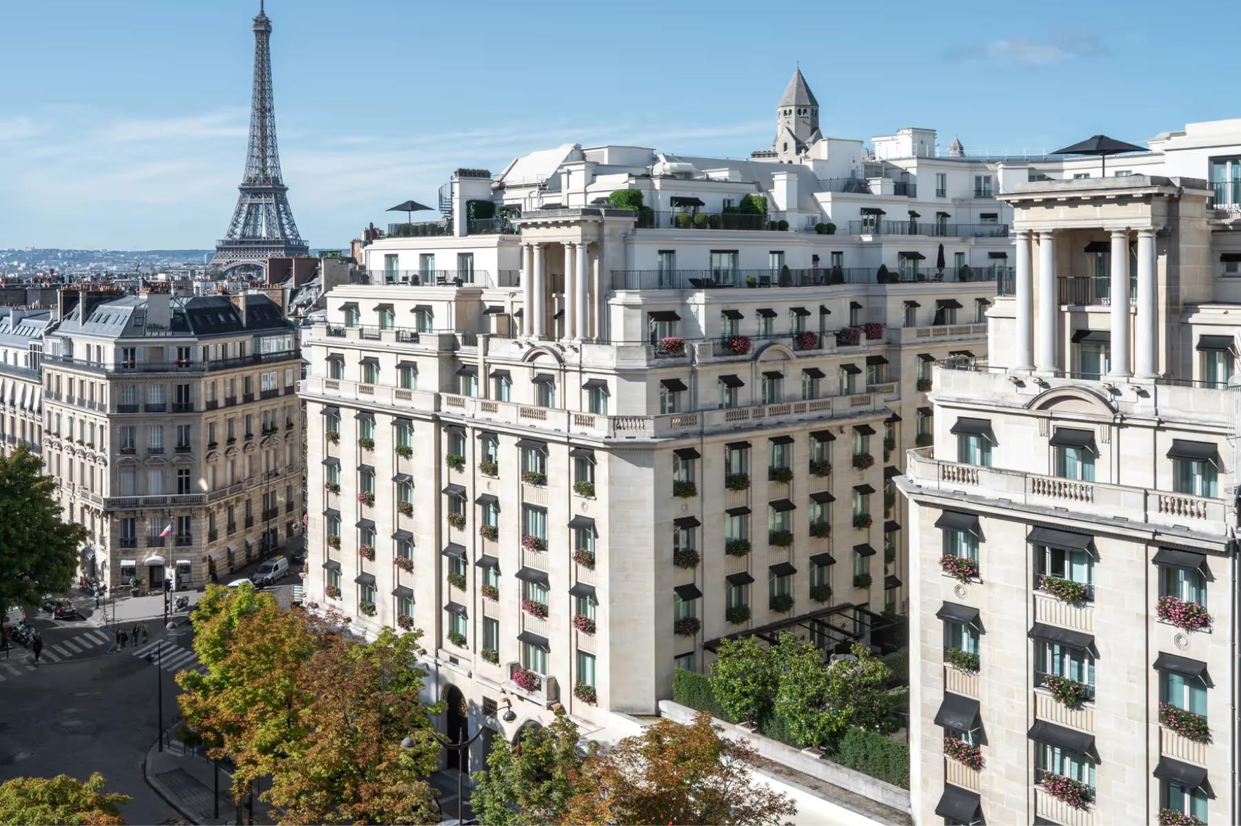 A Parisian cityscape with the Eiffel Tower visible and stone buildings below