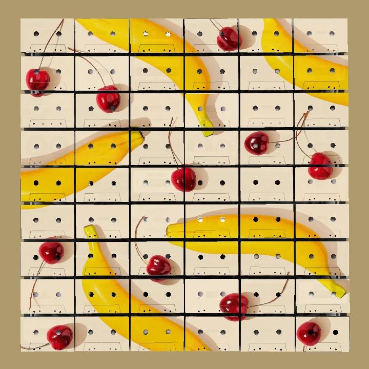 Yellow bananas and red cherries scattered across a cassette mosaic