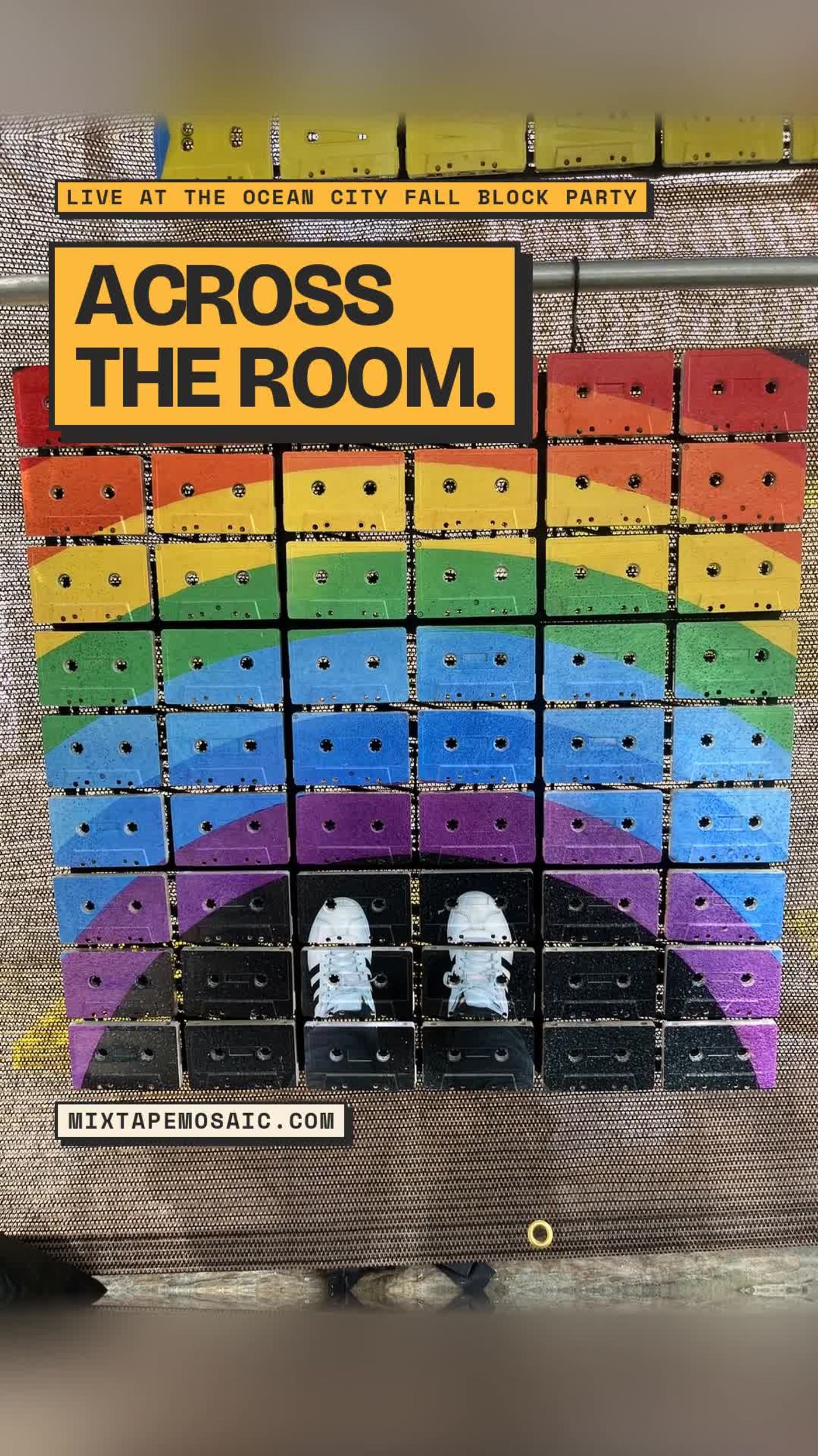 Finished rainbow cassette mosaic with white sneakers displayed on a mesh show wall at the Ocean City Fall Block Party