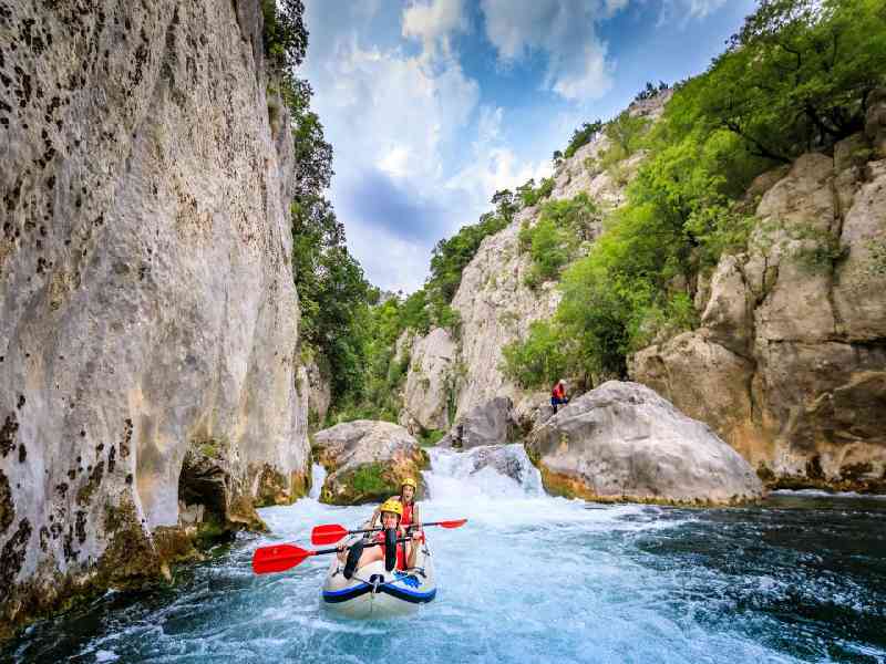 Raft down the Cetina river, navigating emerald waters through stunning landscapes