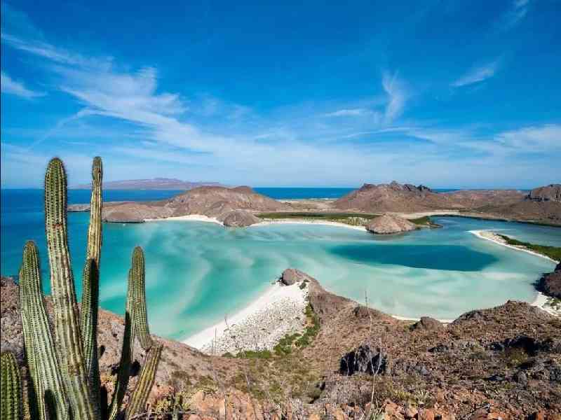 Discover the beauty of Baja Sur through vibrant surf towns, stunning coastlines, and laid-back seaside charm.