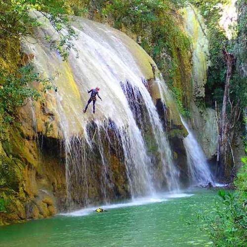 Experience thrilling canyoning with jumps, rappels, and jungle exploration Experience thrilling canyoning with jumps, rappels, and jungle exploration