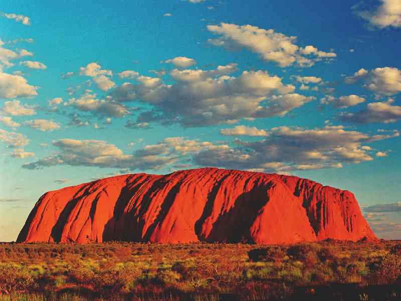 Experience the magic of the Red Centre with guided walks around Uluru, Kata Tjuta, and stunning desert sunsets.