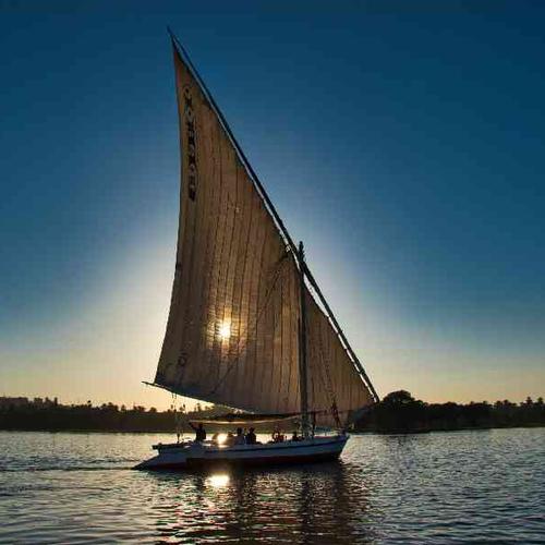 Relax on a traditional felucca and sail leisurely down the Nile Relax on a traditional felucca and sail leisurely down the Nile