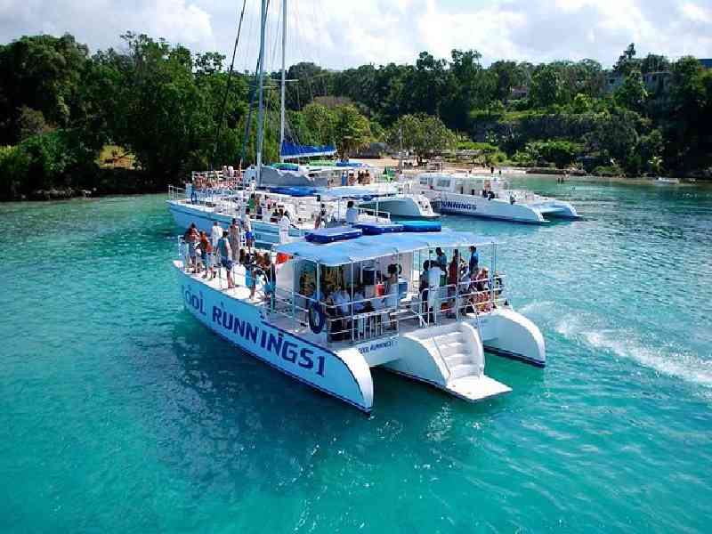 Sail the Caribbean coastline on a scenic catamaran cruise