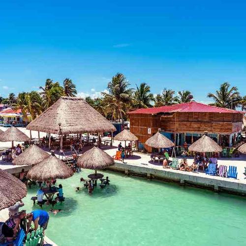 Relax into island life on Caye Caulker with beach bars, ocean views, catamaran cruises, and laid-back vibes. Relax into island life on Caye Caulker with beach bars, ocean views, catamaran cruises, and laid-back vibes.