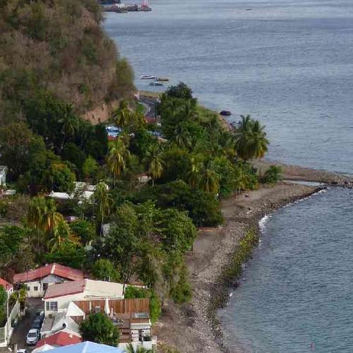 Relax by the Caribbean Sea at Le Carbet Beach with stunning coastal views and tropical island vibes. Relax by the Caribbean Sea at Le Carbet Beach with stunning coastal views and tropical island vibes.