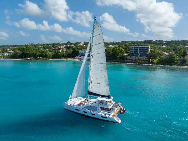 Cruise along Barbados’ breathtaking coastline aboard a luxury catamaran with panoramic Caribbean ocean views.