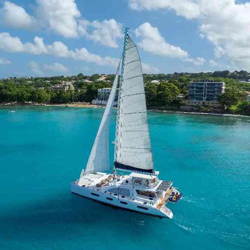Cruise along Barbados’ breathtaking coastline aboard a luxury catamaran with panoramic Caribbean ocean views. Cruise along Barbados’ breathtaking coastline aboard a luxury catamaran with panoramic Caribbean ocean views.