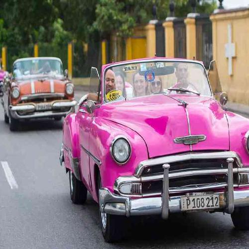Cruise through Havana in classic 1950s convertibles, capturing the city’s iconic style and energy. Cruise through Havana in classic 1950s convertibles, capturing the city’s iconic style and energy.