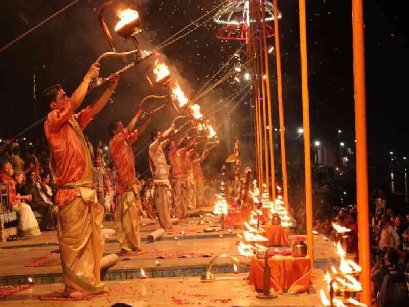 Witness a sacred Aarti ceremony in Varanasi lit by thousands of oil lamps