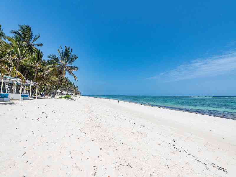 Relax on the white-sand beaches of Diani and discover Swahili coastal culture