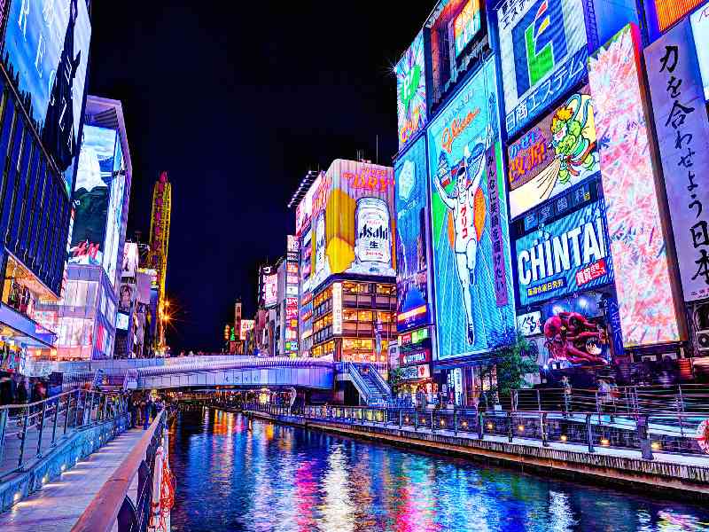 Journey through diverse landscapes, from neon-lit cities to tranquil countryside and natural wonders.