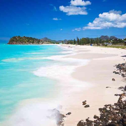 Visit stunning white-sand beaches with crystal-clear Caribbean waters perfect for swimming and relaxing. Visit stunning white-sand beaches with crystal-clear Caribbean waters perfect for swimming and relaxing.