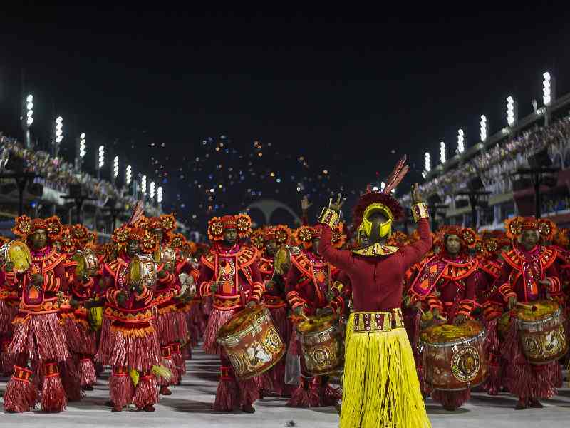 Experience the vibrant energy of Brazil through samba nights, Afro-Brazilian culture, and lively city streets in Salvador and Rio.