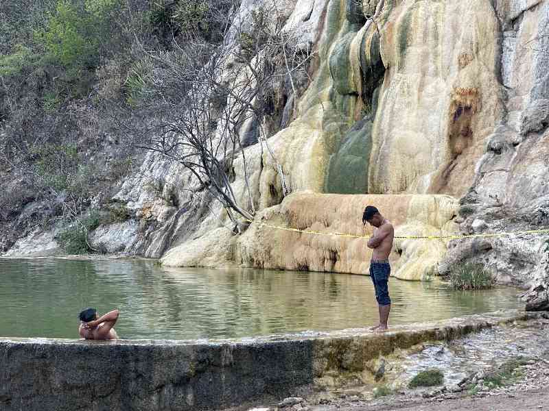Swim in stunning natural mineral pools surrounded by breathtaking mountain landscapes and scenic highlands.